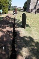 Plate 59. Plates 59 and 60. Line of water supply trench, Trench 1, from south-west corner of cemetery, open and backfilled.