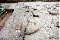 Plate 27. Marl square sitting over the mid-4th century mortar mixing pit which has been cut by the late 4th century drain.