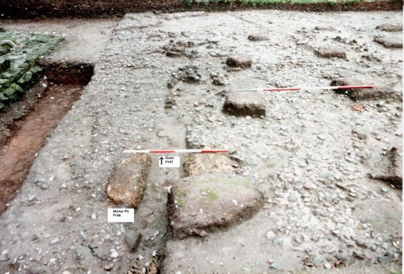 Plate 27. Marl square sitting over the mid-4th century mortar mixing pit which has been cut by the late 4th century drain.